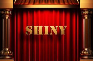 shiny golden word on red curtain photo