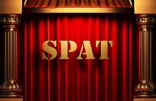 spat golden word on red curtain photo