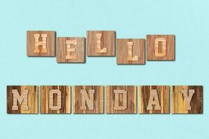 Hello Monday alphabet letters made from wooden on blue background photo