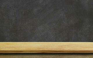 Empty wood table top on chalkboard background. photo