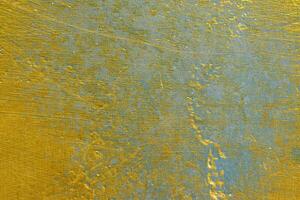 Abstract golden messy wall textured. Gold vintage grunge background.