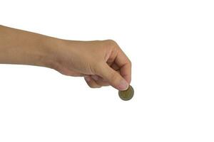Saving money concept. Hand putting coin isolated on white background with clipping path photo
