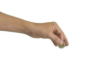 Male hand with coin isolated on white background. with clipping path photo