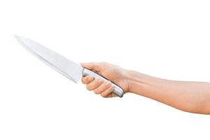 mano sujetando un cuchillo inoxidable aislado sobre fondo blanco con trazado de recorte. foto