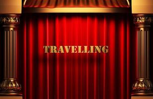 travelling golden word on red curtain photo