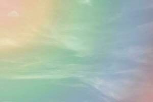 Sunshine clouds sky with a pastel soft color. Abstract blurred cyan gradient of sky nature. photo