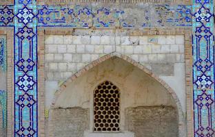 Elements of ancient architecture of Central Asia. Arch and gates of the ancient Asian traditional ornament. photo