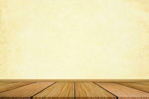 Empty of wooden floor on light yellow pastel color background. For your product display or design. photo