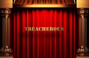 treacherous golden word on red curtain photo