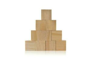 Wood cube stacking as step stair isolated on white background. photo