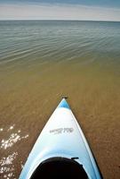 Kayak at waters edge on Lake Winnipeg photo