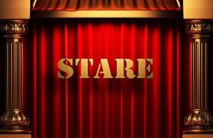 stare golden word on red curtain photo