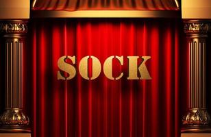 sock golden word on red curtain photo