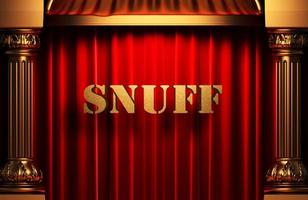 snuff golden word on red curtain photo