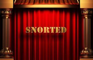 snorted golden word on red curtain photo
