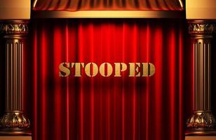 stooped golden word on red curtain photo