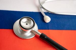 Black stethoscope on Russia flag background, Business and finance concept. photo