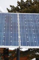 Solar panels at Smoothstones Lake in Northern Saskatchewan photo