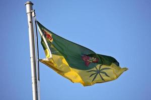 Saskatchewan flag blowing by the wind photo