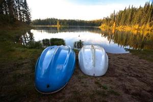 Two rowboats at Jade Lake in Northern Saskatchewan photo