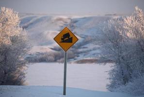 Road sign with of Buffalo Pound Lake in winter photo
