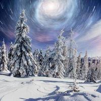 starry sky in winter snowy night. fantastic milky way in the New Year's Eve. Courtesy of NASA. In anticipation of the holiday. Dramatic scene. Carpathian. Ukraine photo