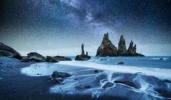 The Rock Troll Toes. Reynisdrangar cliffs. Black sand beach. Iceland photo