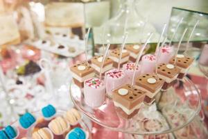 Delicious sweets on candy buffet photo