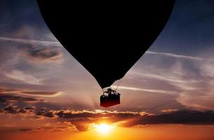Balloon silhouette in the sunset photo