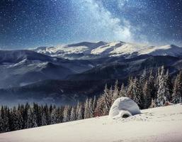 yurt in winter fog mountains. Carpathian, Ukraine, Europe photo