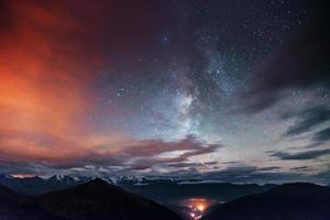 Fantastic starry sky. Thick fog on the mountain pass Goulet. Georgia, Svaneti. Europe photo