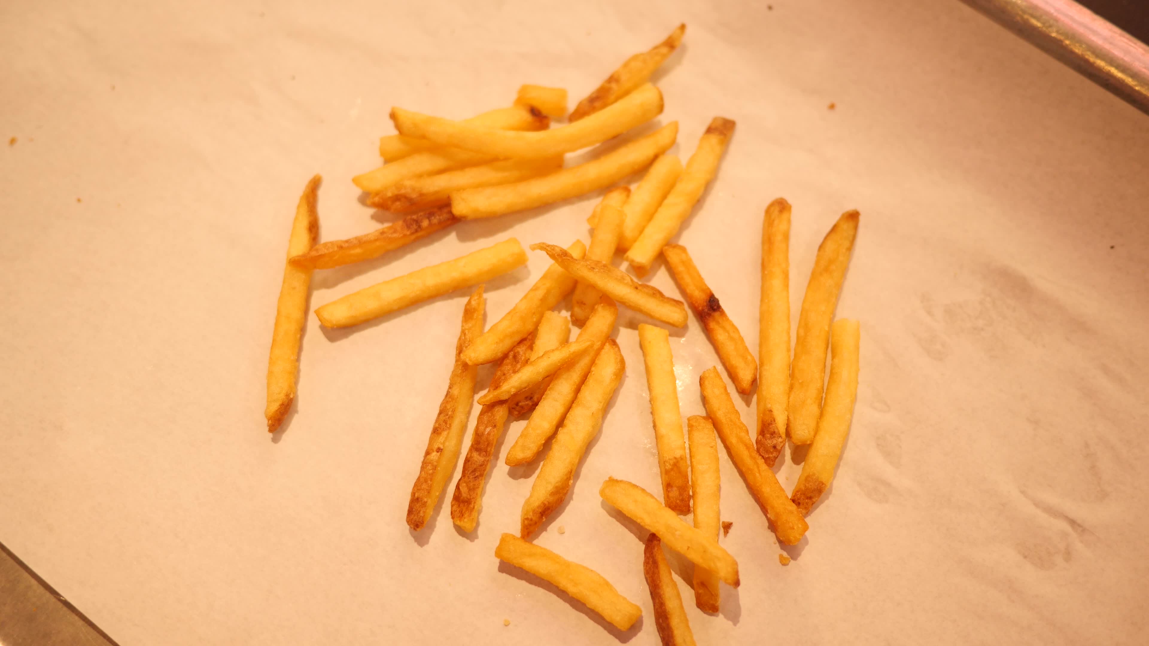 Close-up of Hands taking French Fries Potato from a Table 6279328 Stock ...