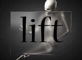 lift word on glass and skeleton photo