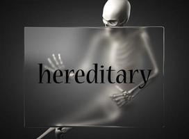 hereditary word on glass and skeleton photo