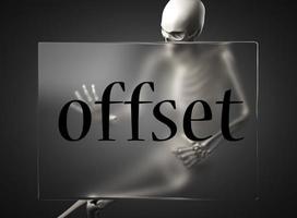 offset word on glass and skeleton photo