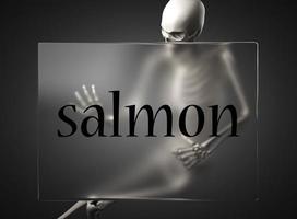 salmon word on glass and skeleton photo