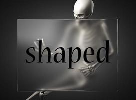 shaped word on glass and skeleton photo