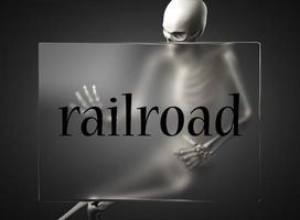 railroad word on glass and skeleton photo