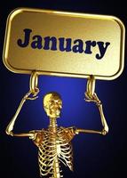 palabra enero y esqueleto dorado foto