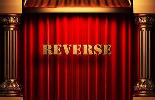 reverse golden word on red curtain photo