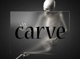 carve word on glass and skeleton photo