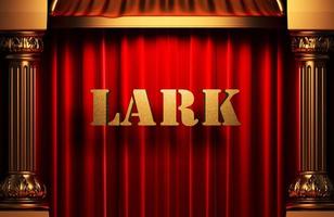 lark golden word on red curtain photo