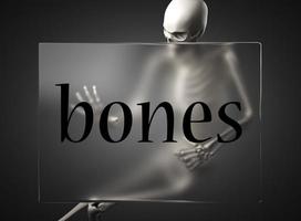 palabra de huesos en vidrio y esqueleto foto