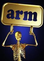brazo palabra y esqueleto dorado foto