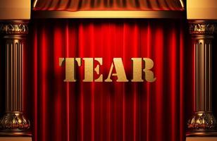 tear golden word on red curtain photo