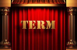 term golden word on red curtain photo