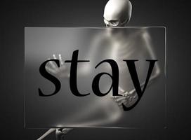 stay word on glass and skeleton photo