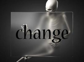 change word on glass and skeleton photo