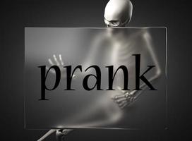 prank word on glass and skeleton photo