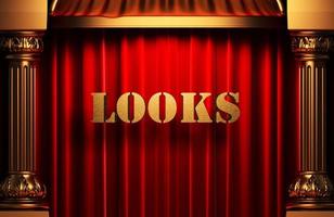 looks golden word on red curtain photo